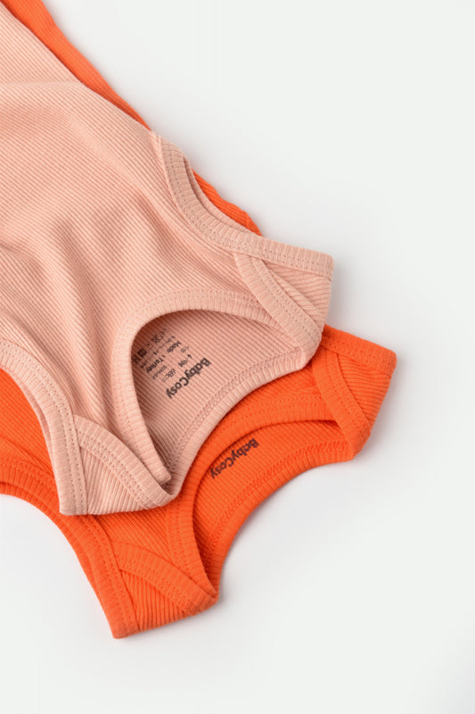 Set 2 body-uri fara maneci bebe unisex din bumbac organic si modal - Rodie/Piersica, BabyCosy