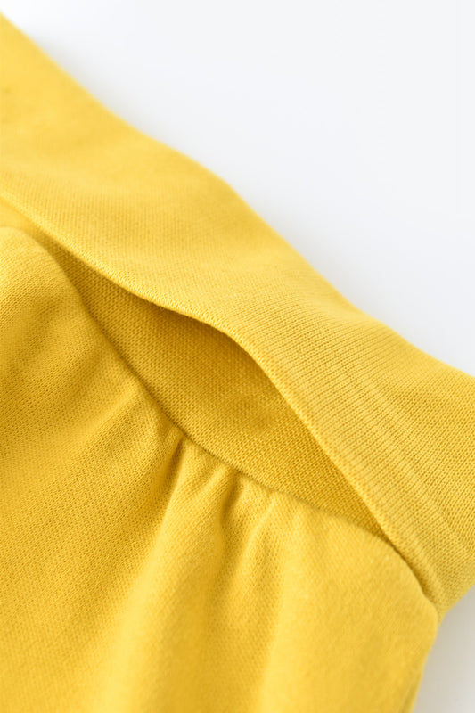 Pantaloni Bebe Unisex din bumbac organic Galben deschis BabyCosy